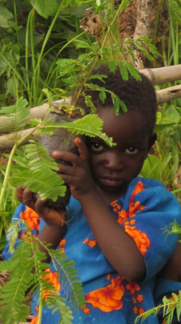 Tanzanian Girl with a seedling